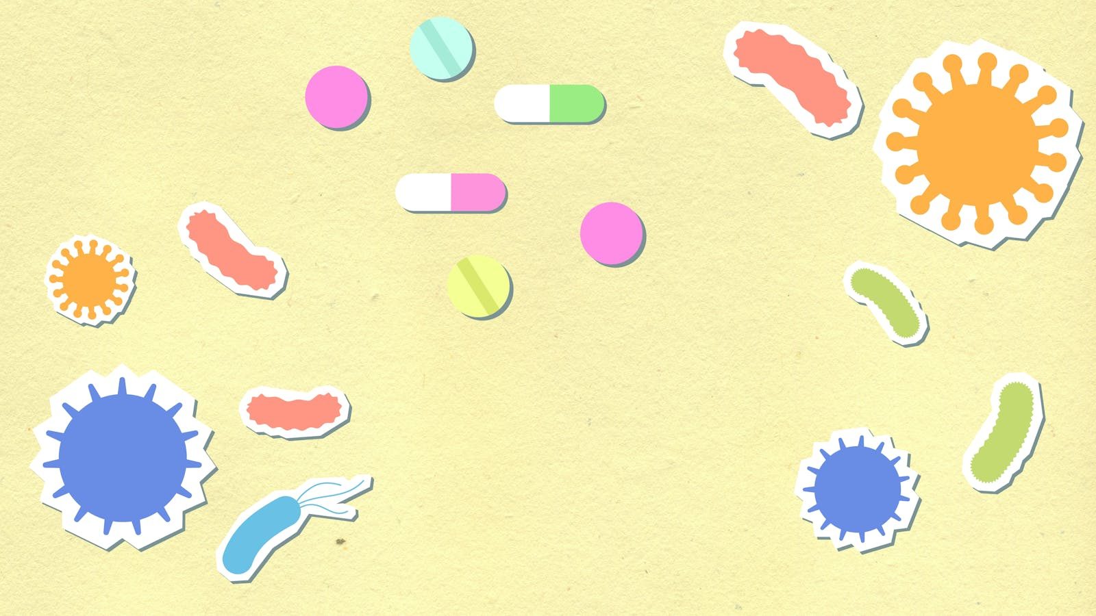 Paper cutout of colorful contagious types of viruses on yellow background with pills and capsules for treatment during disease care routine
