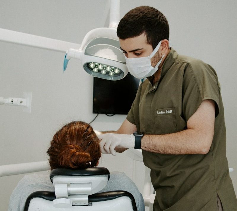 a dentist examining a patient